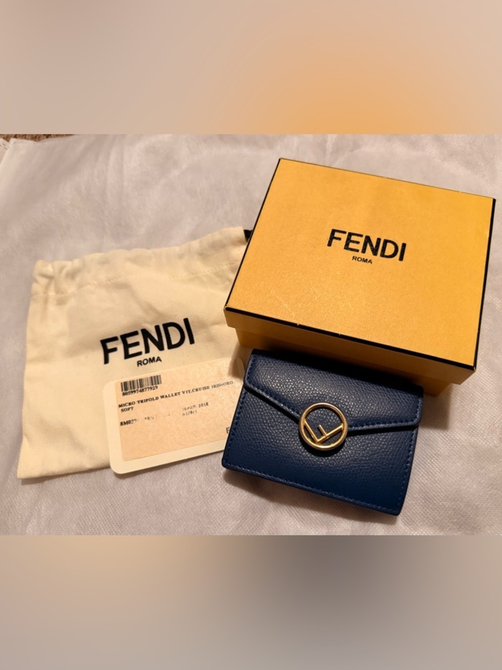 Fendi Small Trifold Wallet in Navy with Gold Logo